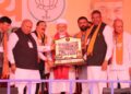 Upcoming Dhaman Gujarati movie's producer Bhupat Bodar presents memento to PM Modi behalf of his Dhaman team